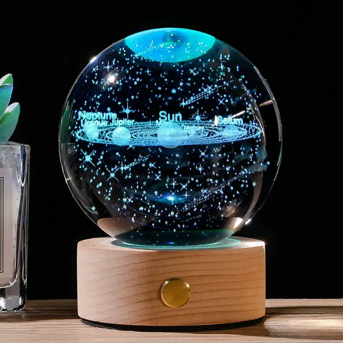 Starry Sky Luminous Ornaments Universe Galaxy Crystal Ball with glowing celestial design on wooden base