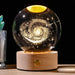 Starry Sky Luminous Ornaments Universe Galaxy Crystal Ball with zodiac-inspired design glowing on a wooden base.