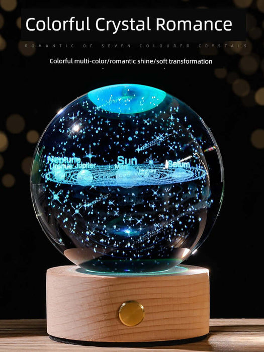 Starry Sky Luminous Ornaments Universe Galaxy Crystal Ball on a wooden base, glowing with celestial light and featuring zodiac planets.